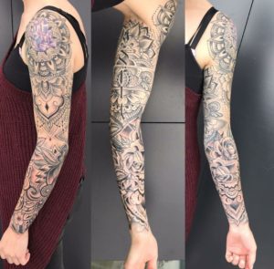 three pictures of a tattooed woman with a black and grey henna style sleeve with mandala and roses on her left arm